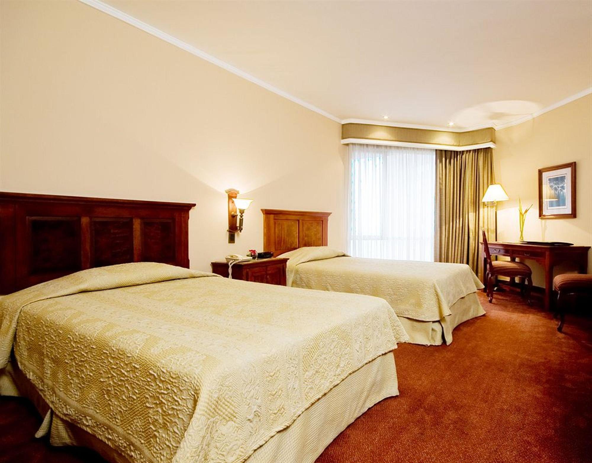 Hotel Dann Carlton Belfort Medellín Kültér fotó A room at the hotel